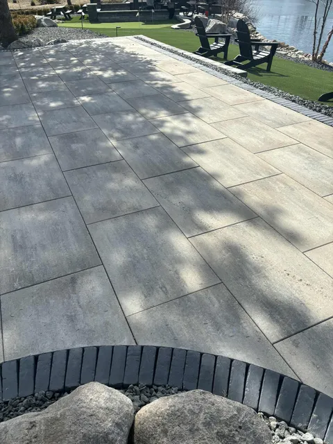 Large paver patio — waterfront property